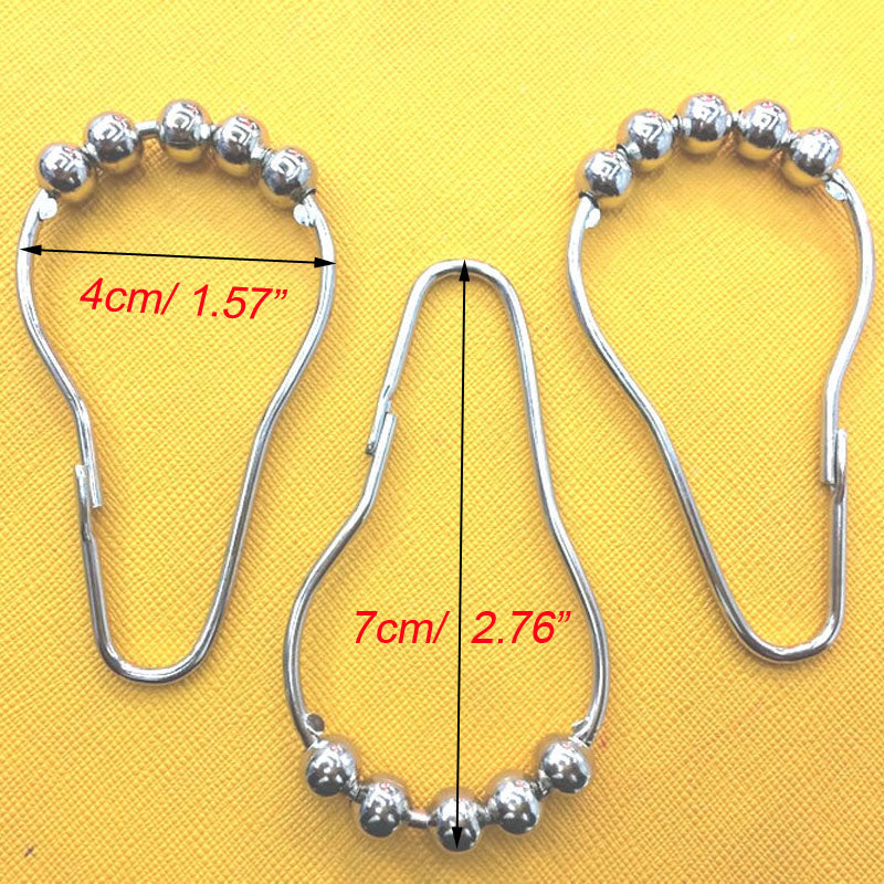 12 ganchos de cortina de acero inoxidable.