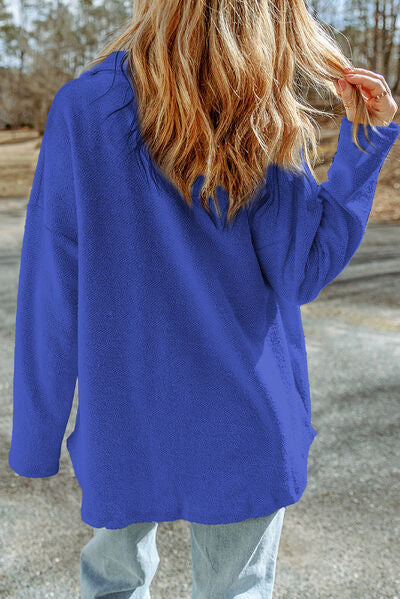 Chaqueta con hombros caídos y botones con bolsillo