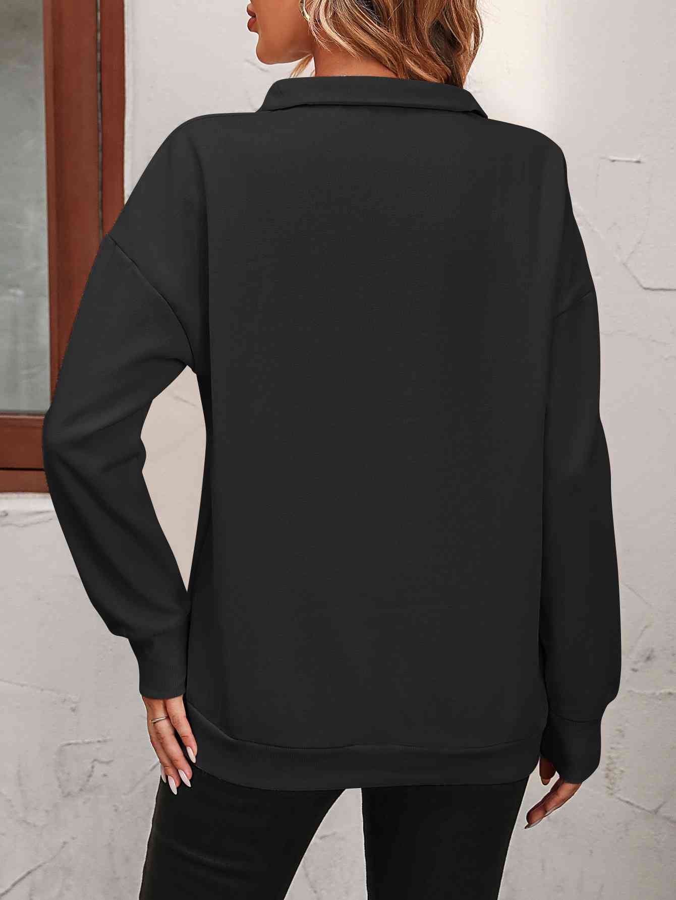 Sudadera con cremallera y hombros caídos