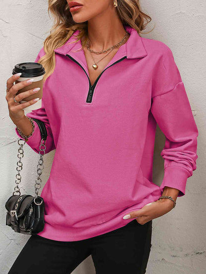 Sudadera con cremallera y hombros caídos