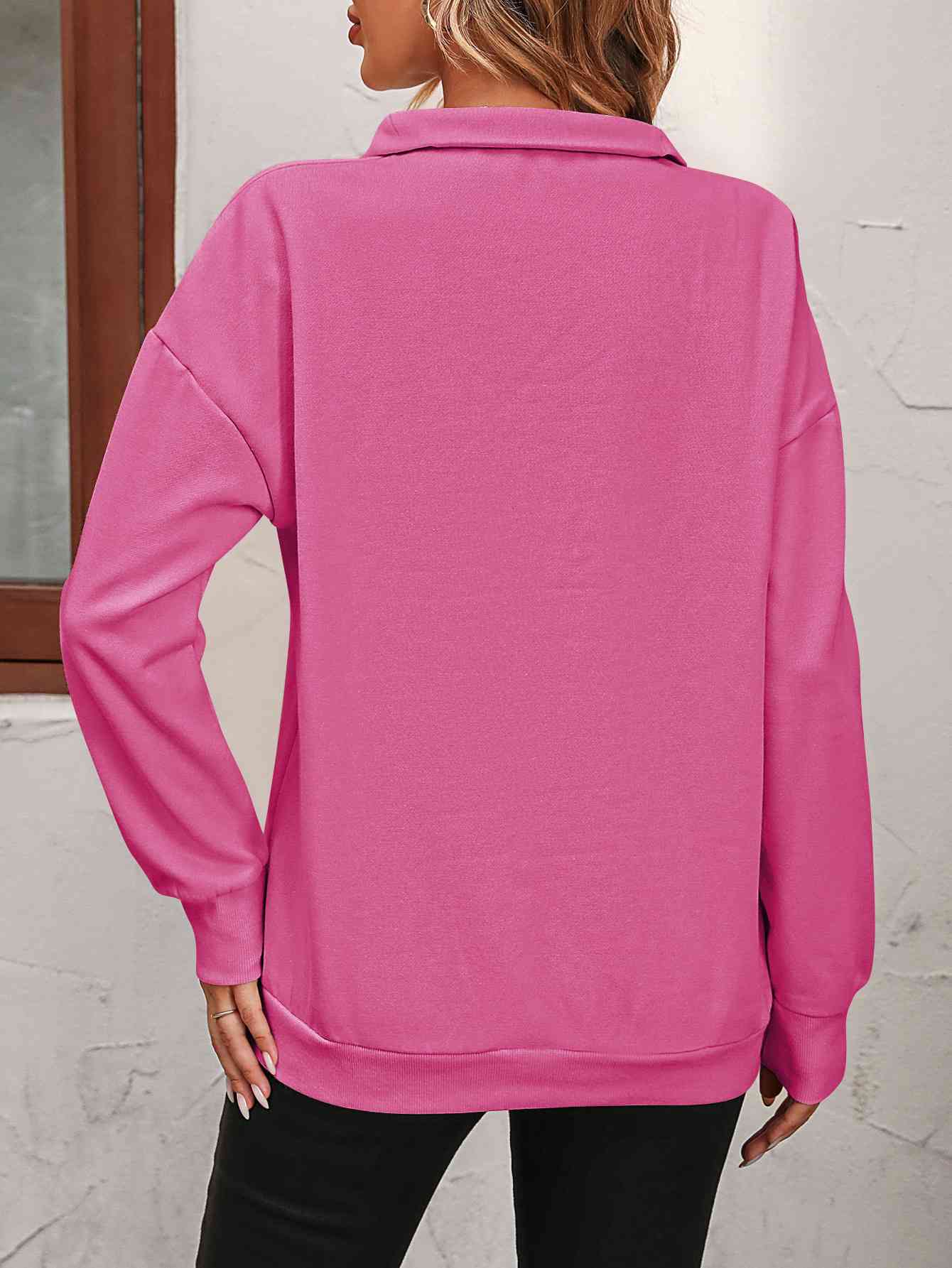 Sudadera con cremallera y hombros caídos